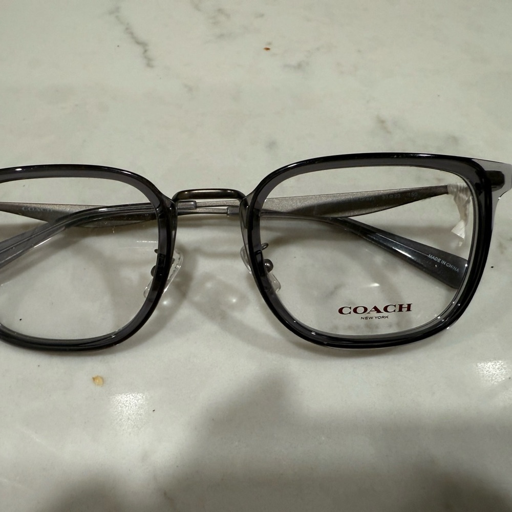 Coach Eye Glass Frames
Model HC5177